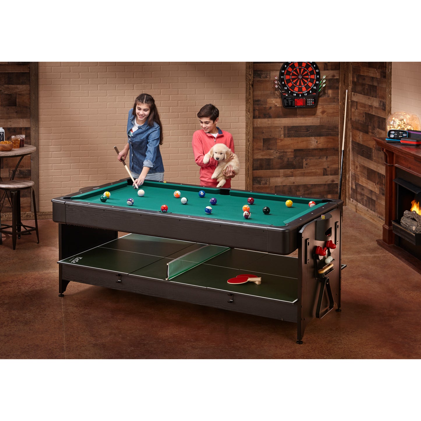 two kids setting up a billiard game on the Fat Cat Original 3-in-1 Blue 7' Pockey™ Multi-Game Table 