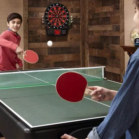 kids playing ping pong table tennis on the Fat Cat Original 3-in-1 Blue 7' Pockey™ Multi-Game Table ball in play