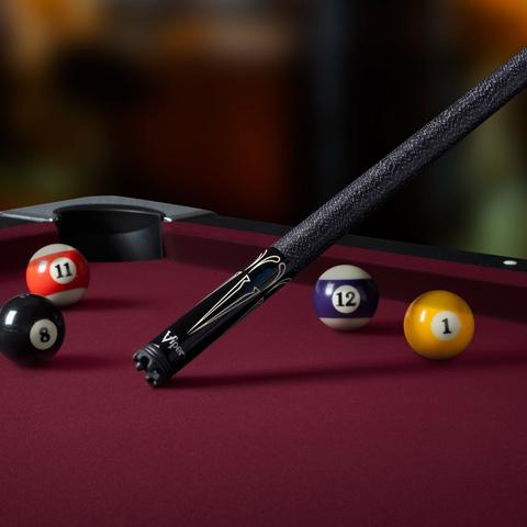 Viper Sinister Black and White Billiard/Pool Cue Stick on billiard table